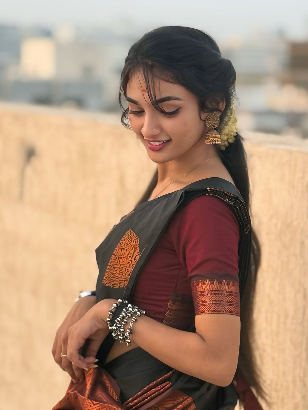 Nemesis Black Soft Silk Saree With Scrumptious Blouse Piece