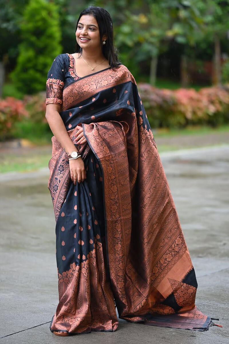 Gleaming Black Soft Silk Saree With Invaluable Blouse Piece