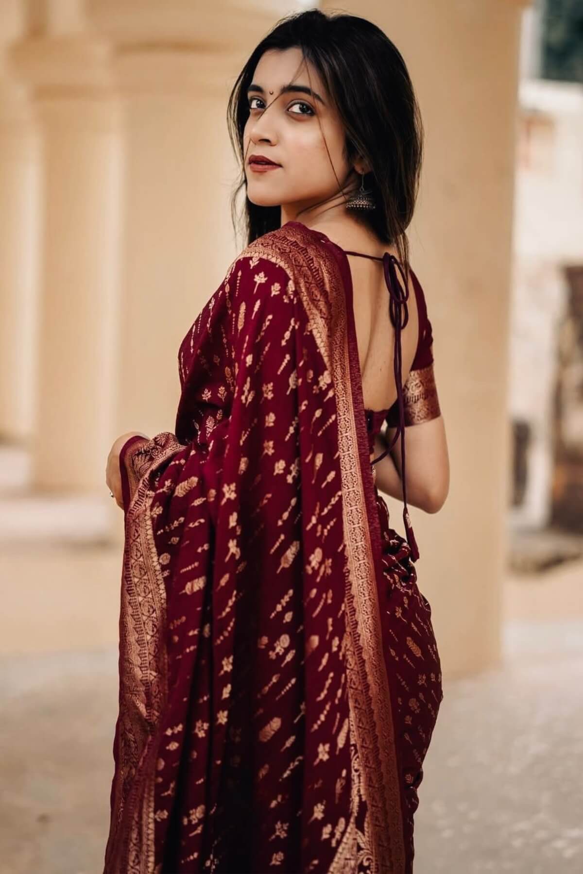 Dulcet Maroon Soft Silk Saree With Twirling Blouse Piece