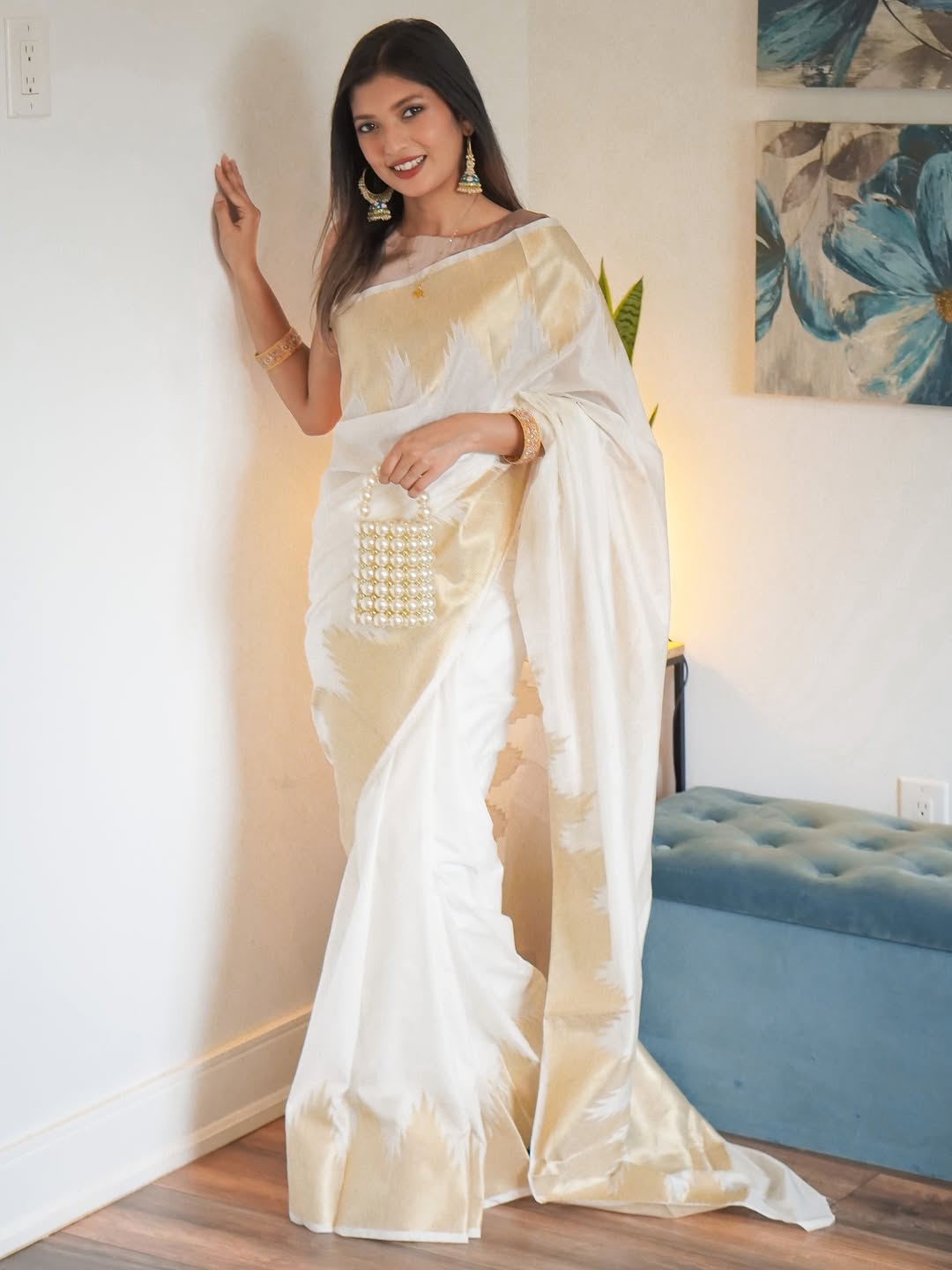 Symmetrical Beige Soft Silk Saree With Cynosure Blouse Piece