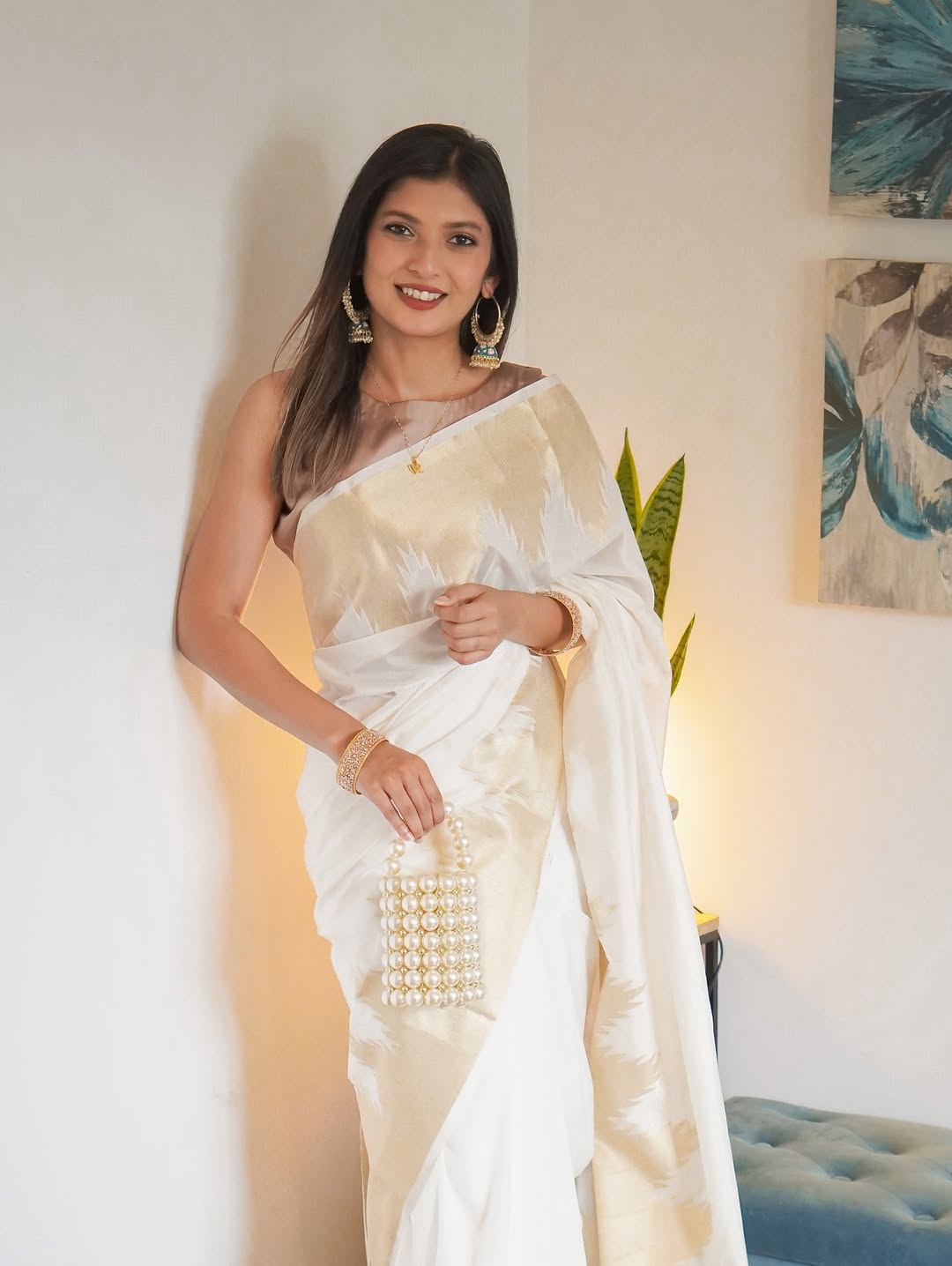 Symmetrical Beige Soft Silk Saree With Cynosure Blouse Piece
