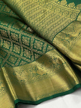 Charismatic Dark Green Soft Silk Saree With Redolent Blouse Piece