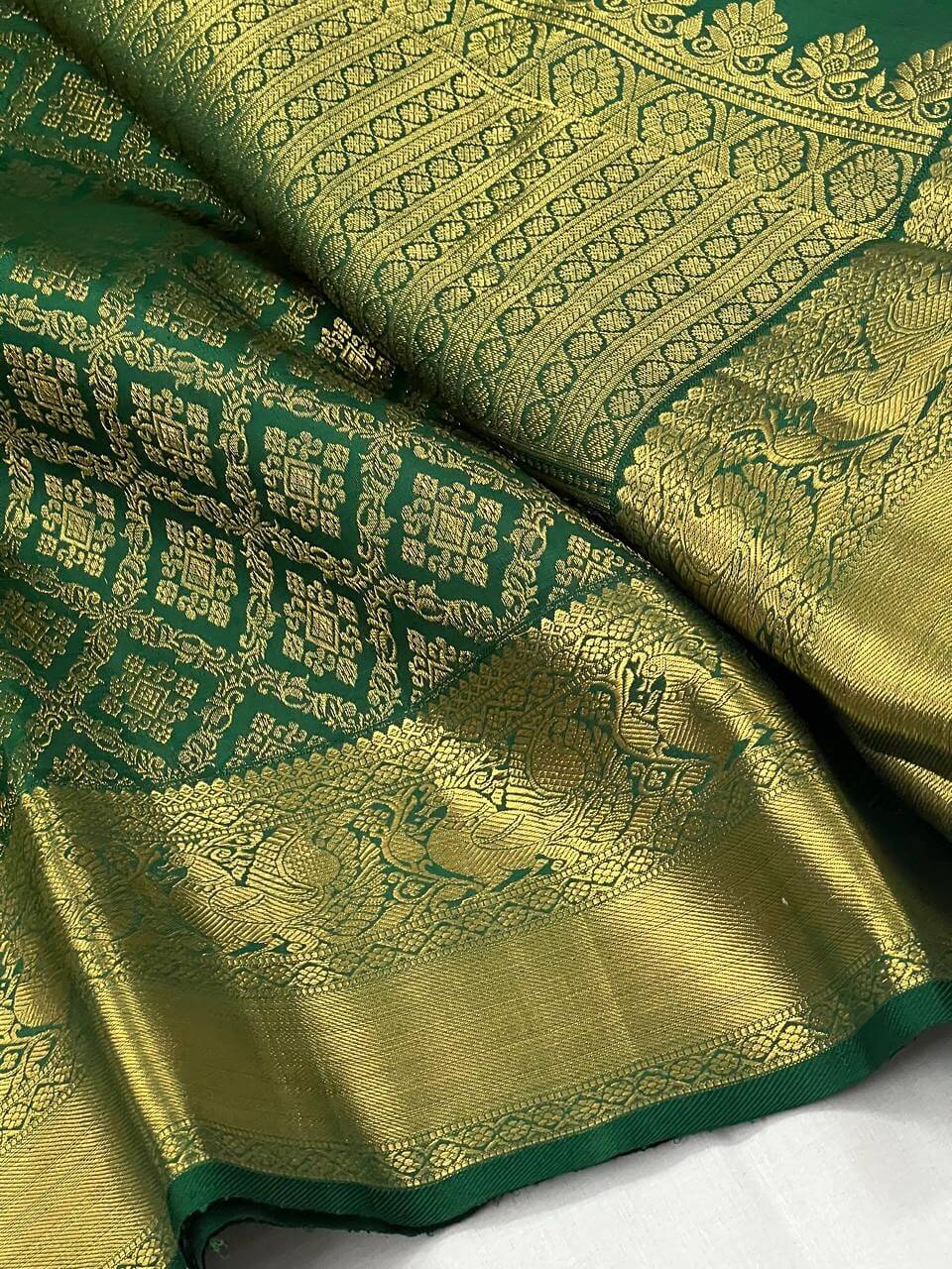 Charismatic Dark Green Soft Silk Saree With Redolent Blouse Piece