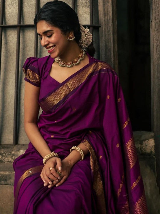 Elaborate Purple Soft Silk Saree With Denouement Blouse Piece