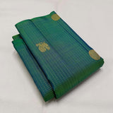 Sumptuous Rama Soft Silk Saree With Surpassing Blouse Piece