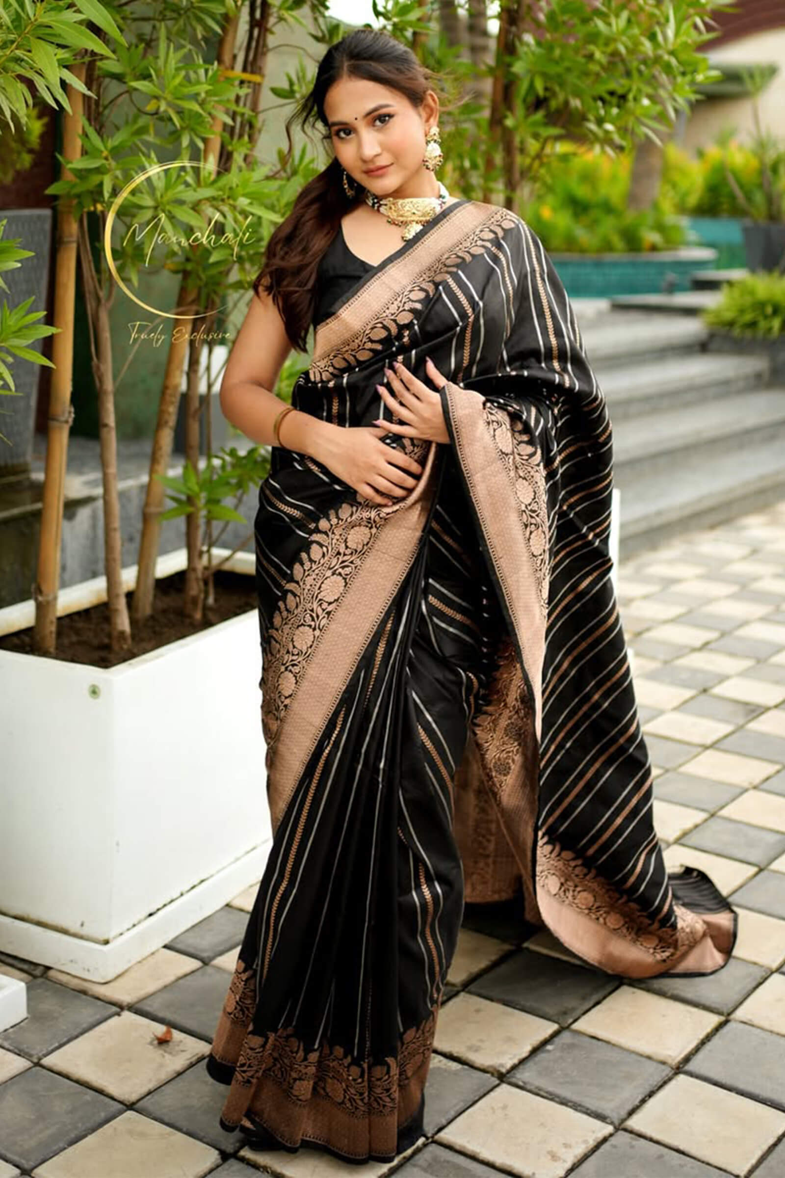 Evocative Black Soft Silk Saree With Staggering Blouse Piece