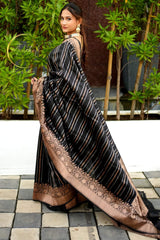 Evocative Black Soft Silk Saree With Staggering Blouse Piece