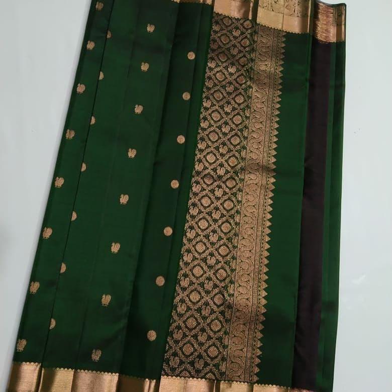 Sophisticated Dark Green Soft Silk Saree With Precious Blouse Piece