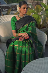 Alluring Dark Green Soft Silk Saree With Entrancing Blouse Piece