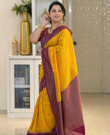Adorning Yellow Soft Silk Saree With Unique Blouse Piece