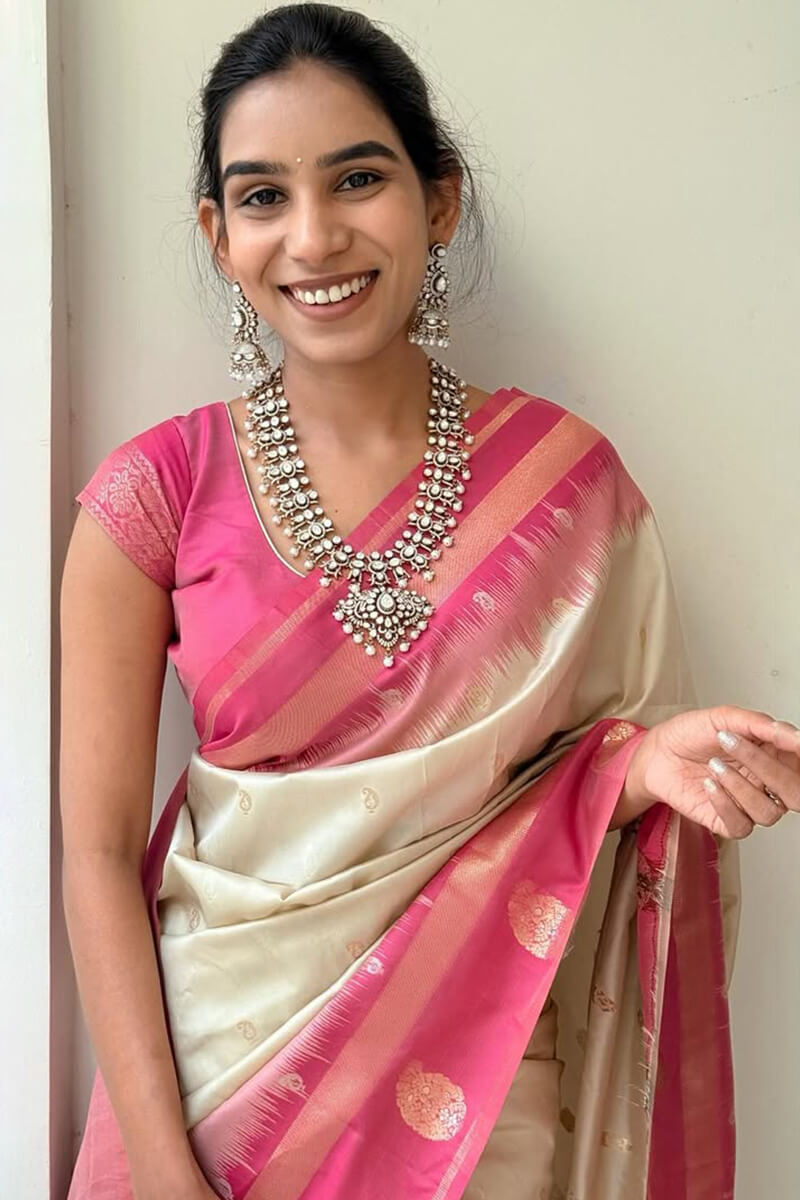 Cynosure Beige Soft Silk Saree With Delightful Blouse Piece