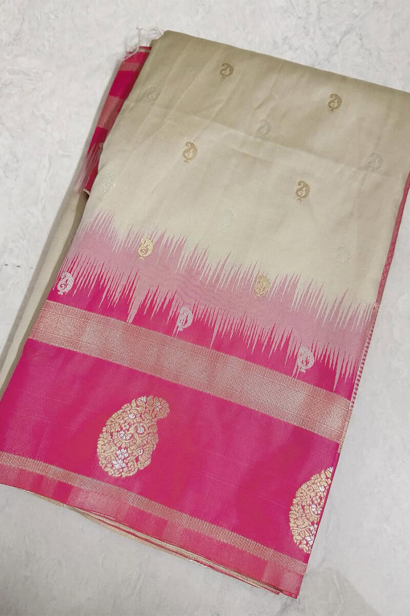 Cynosure Beige Soft Silk Saree With Delightful Blouse Piece