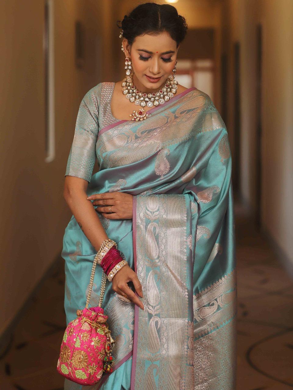 Scintillating Firozi Soft Banarasi Silk Saree With Preferable Blouse Piece