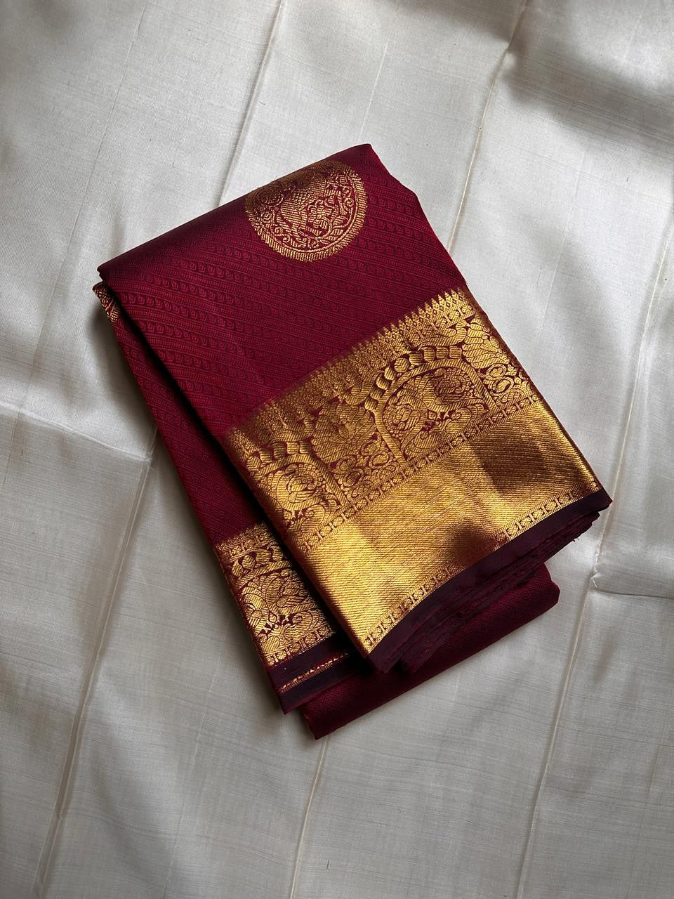 Embellished Maroon Soft Banarasi Silk Saree With Gossamer Blouse Piece