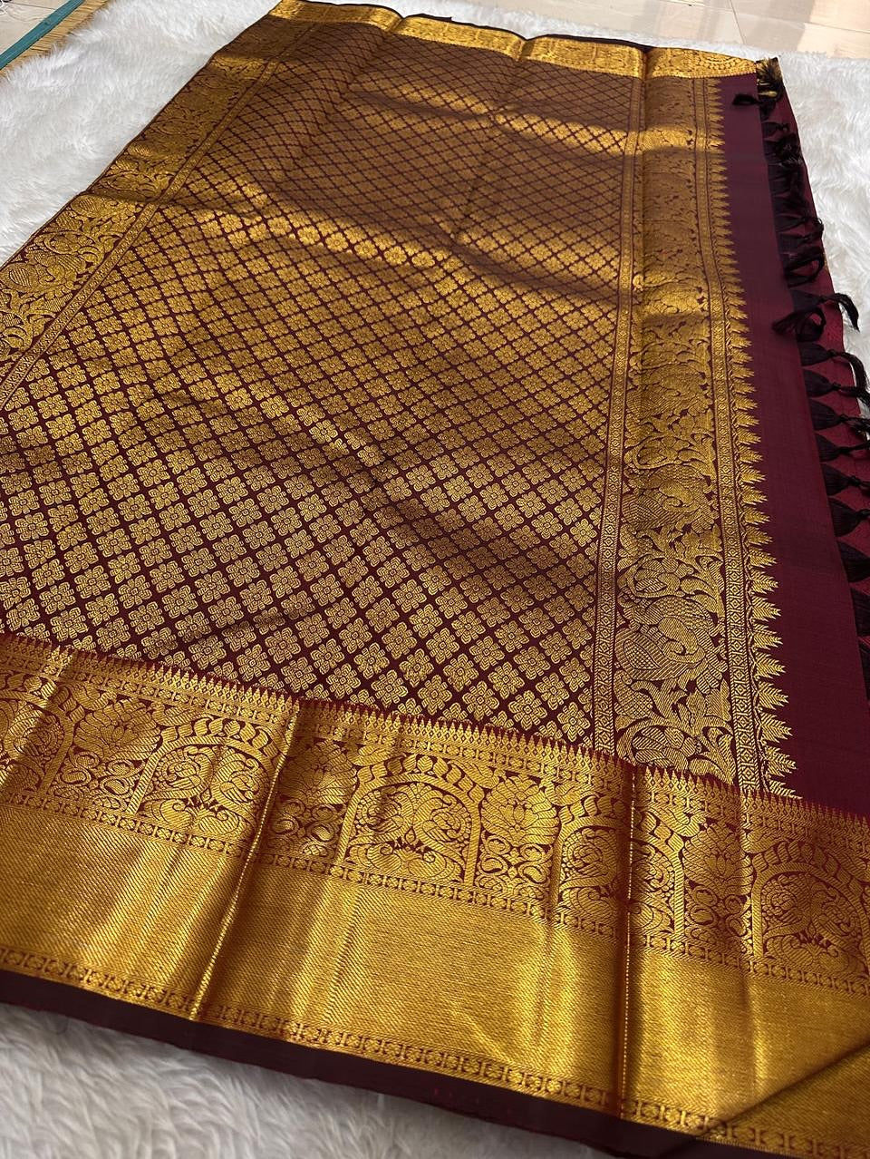 Embellished Maroon Soft Banarasi Silk Saree With Gossamer Blouse Piece