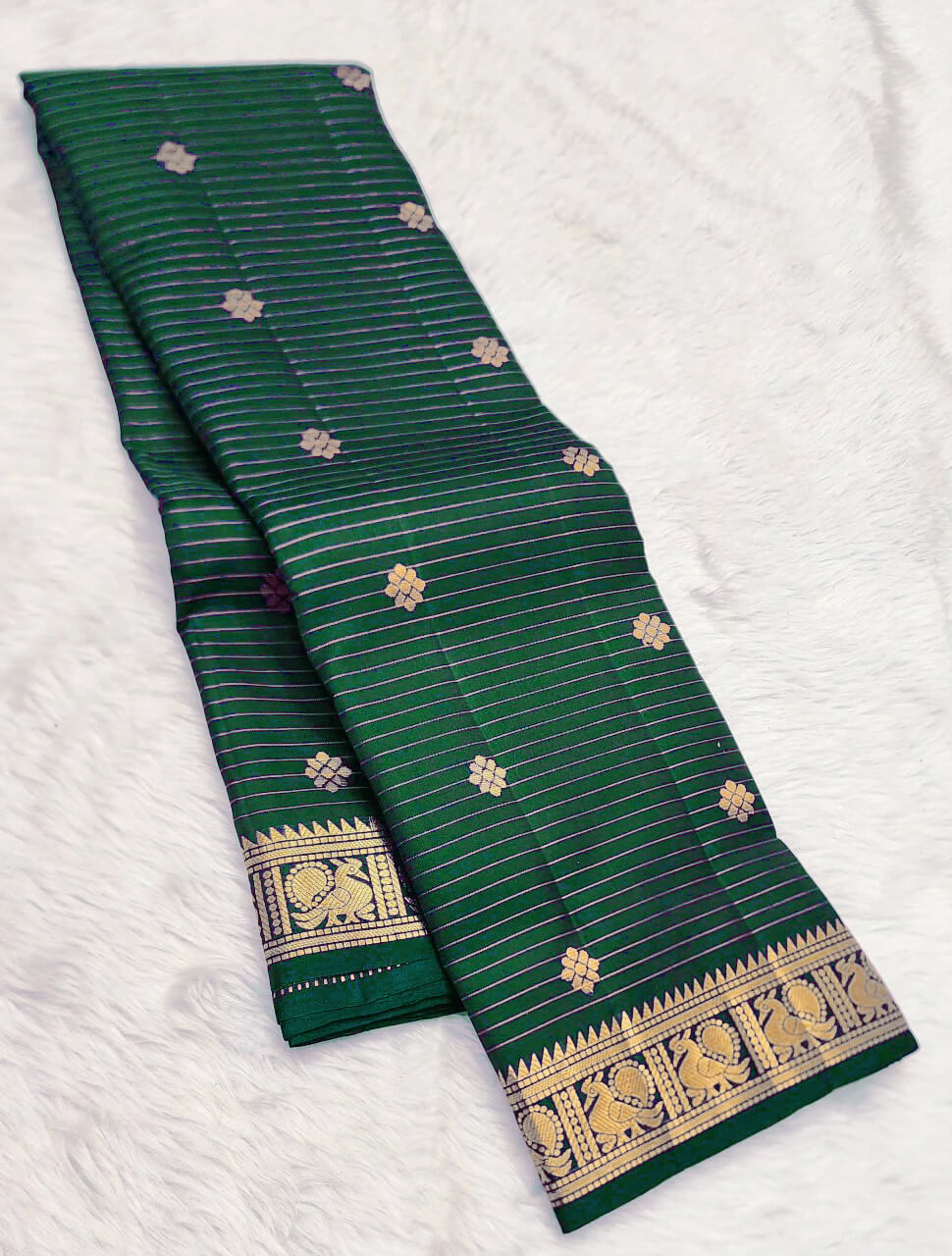 Incomparable Dark Green Soft Silk Saree With Vivacious Blouse Piece