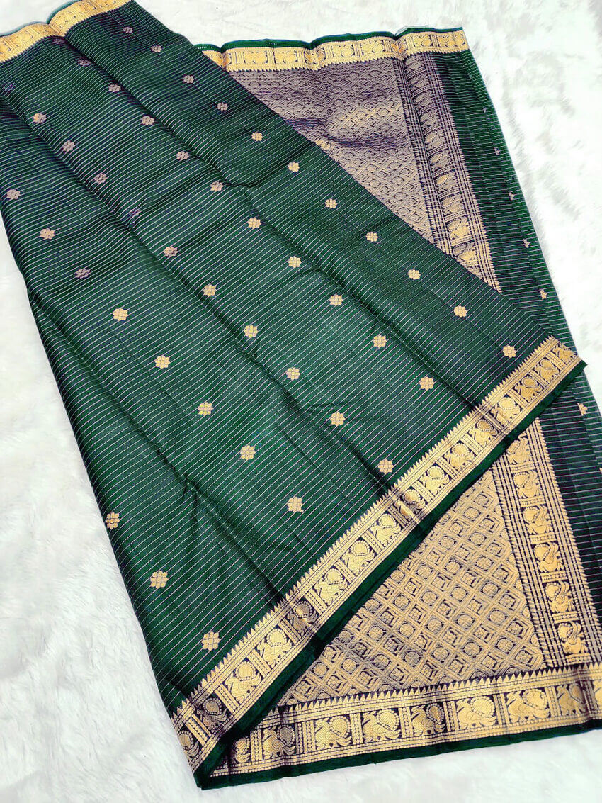Incomparable Dark Green Soft Silk Saree With Vivacious Blouse Piece