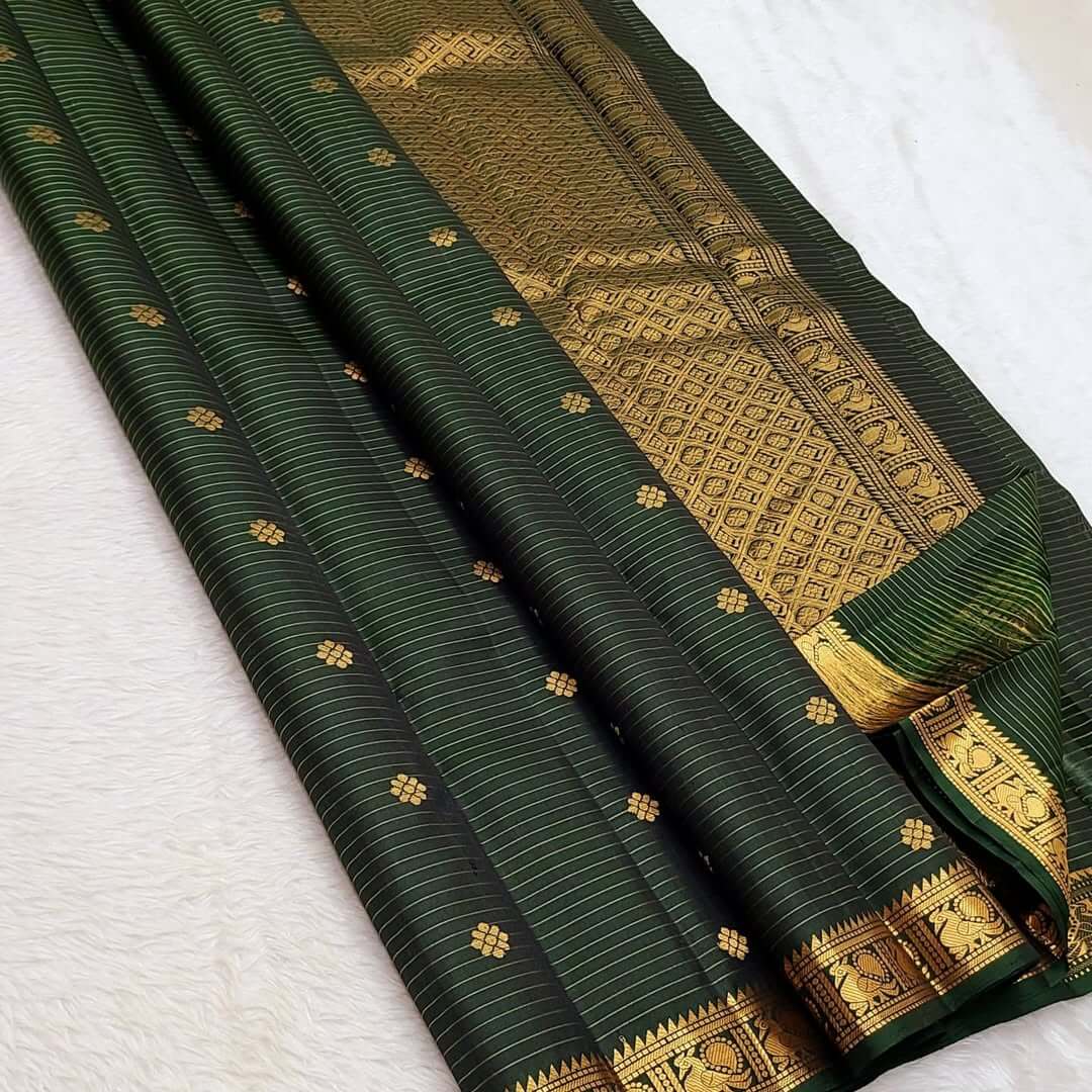 Incomparable Dark Green Soft Silk Saree With Vivacious Blouse Piece