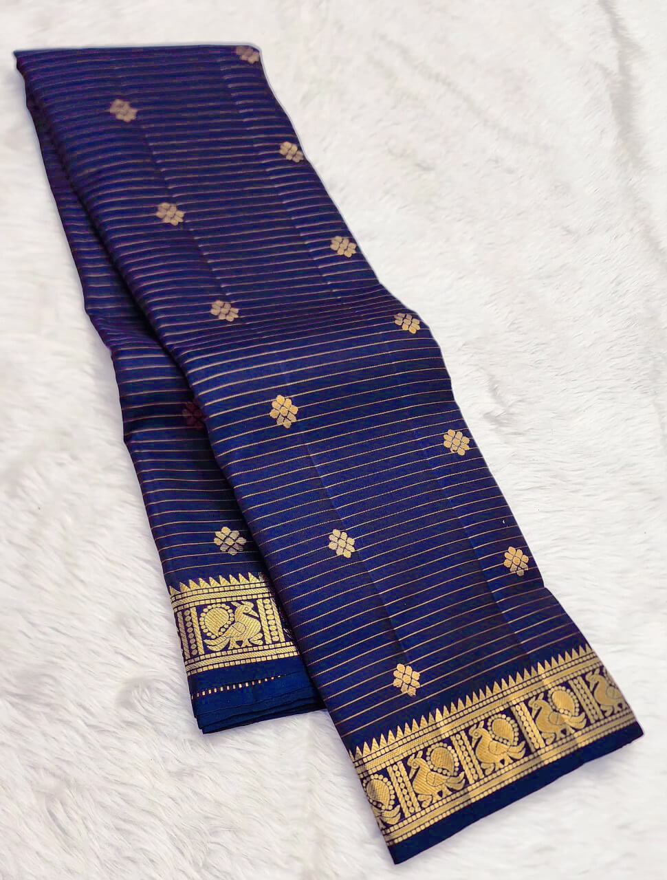 Snazzy Navy Blue Soft Silk Saree With Opulent Blouse Piece