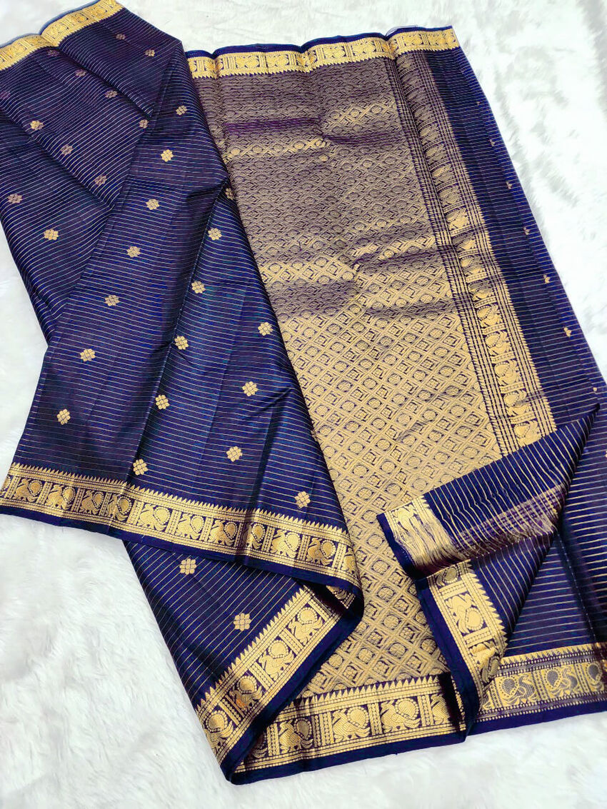Snazzy Navy Blue Soft Silk Saree With Opulent Blouse Piece