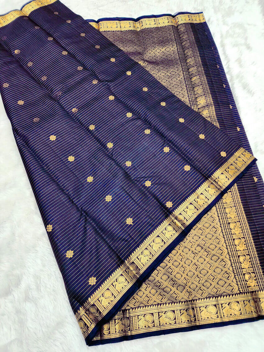 Snazzy Navy Blue Soft Silk Saree With Opulent Blouse Piece