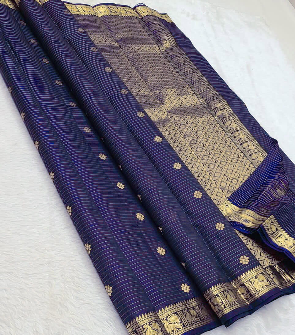 Snazzy Navy Blue Soft Silk Saree With Opulent Blouse Piece