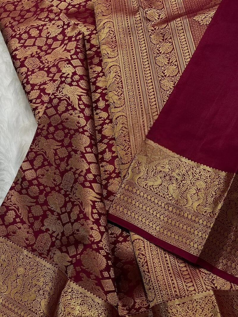 Appealing Wine Pure Zari Weaving Banarasi Silk Saree With Lissome Blouse Piece