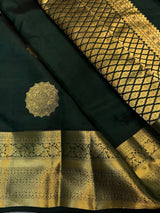 Eloquence Dark Green Pure Zari Weaving Banarasi Silk Saree With Bewitching Blouse Piece