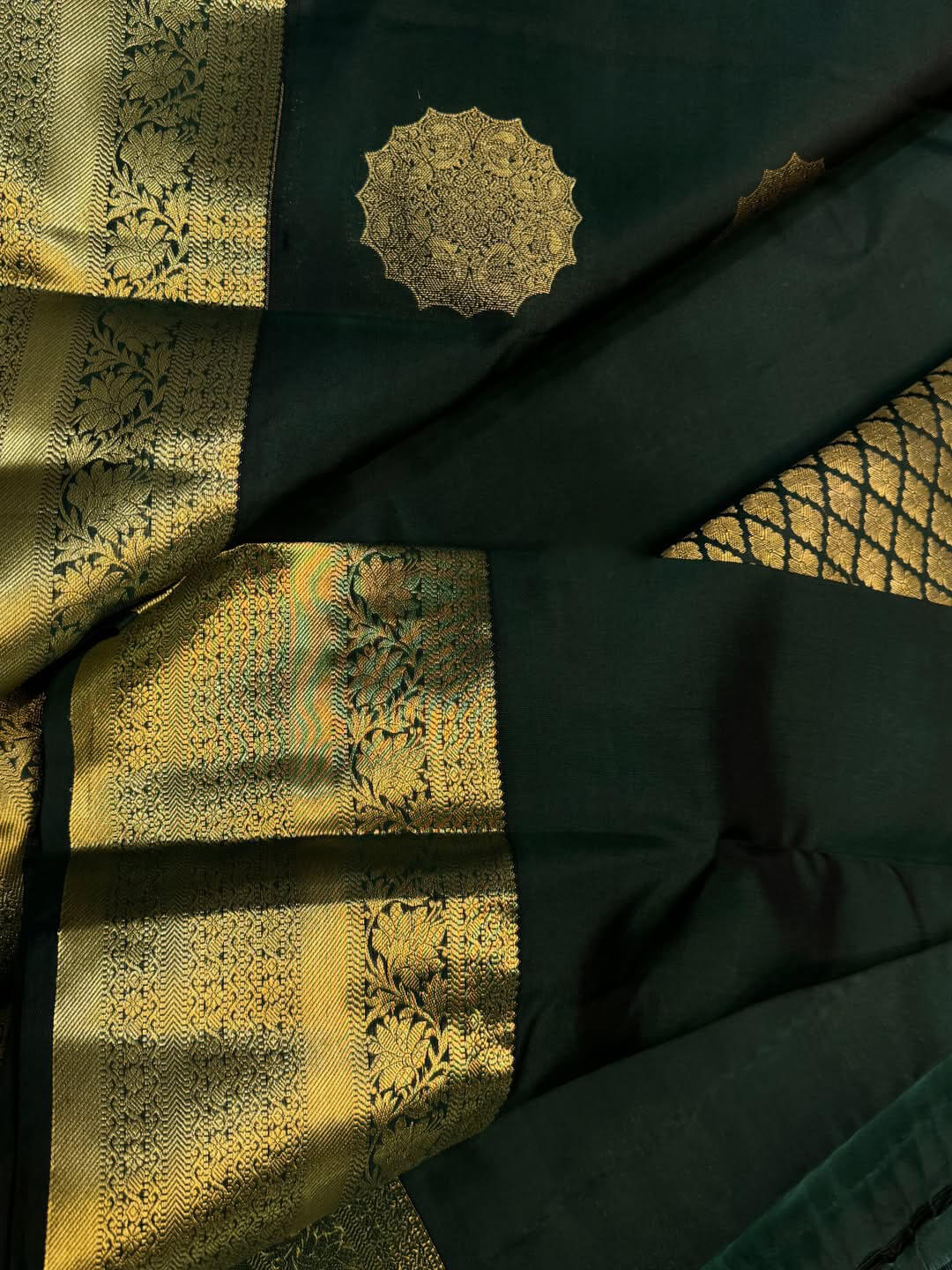 Eloquence Dark Green Pure Zari Weaving Banarasi Silk Saree With Bewitching Blouse Piece