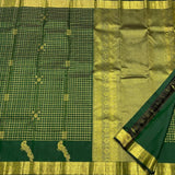 Traditional Dark Green Pure Zari Weaving Banarasi Silk Saree With Demure Blouse Piece