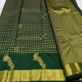 Traditional Dark Green Pure Zari Weaving Banarasi Silk Saree With Demure Blouse Piece