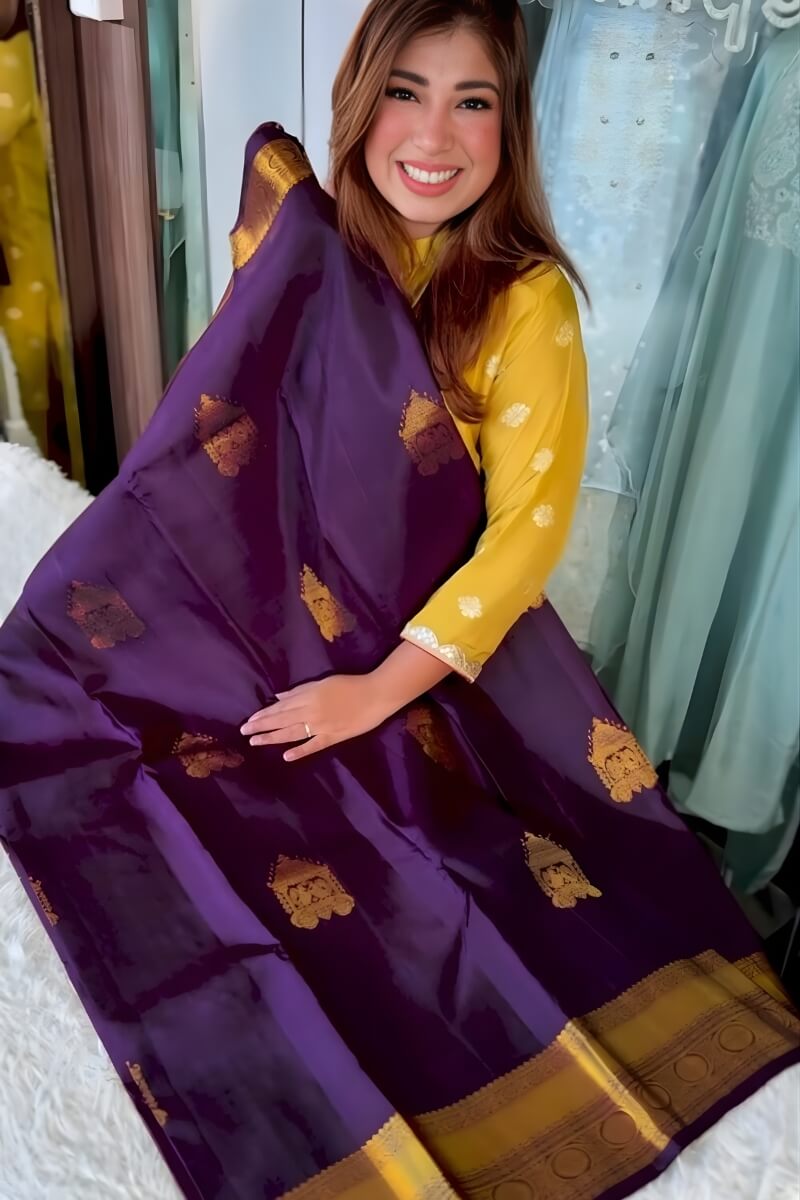 Adoring Purple Pure Zari Weaving Banarasi Silk Saree With Twirling Blouse Piece