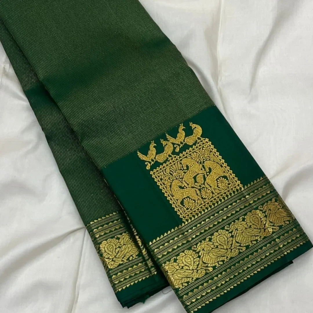 Allure Dark Green Pure Zari Weaving Banarasi Silk Saree With Grandiose Blouse Piece