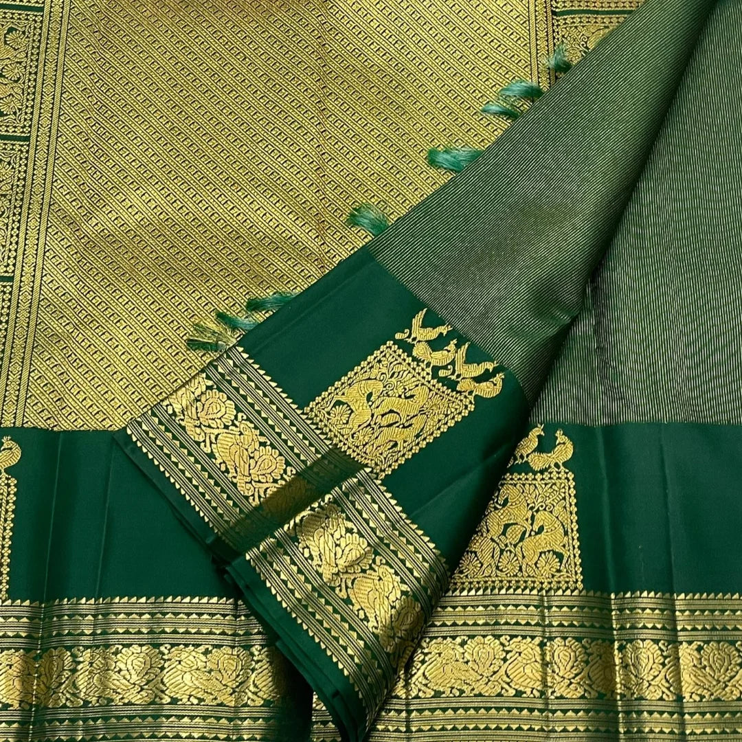 Allure Dark Green Pure Zari Weaving Banarasi Silk Saree With Grandiose Blouse Piece