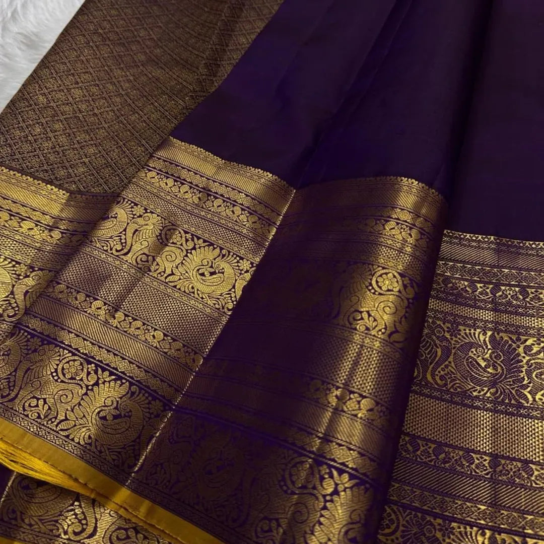 Engaging Purple Pure Zari Weaving Banarasi Silk Saree With Beauteous Blouse Piece