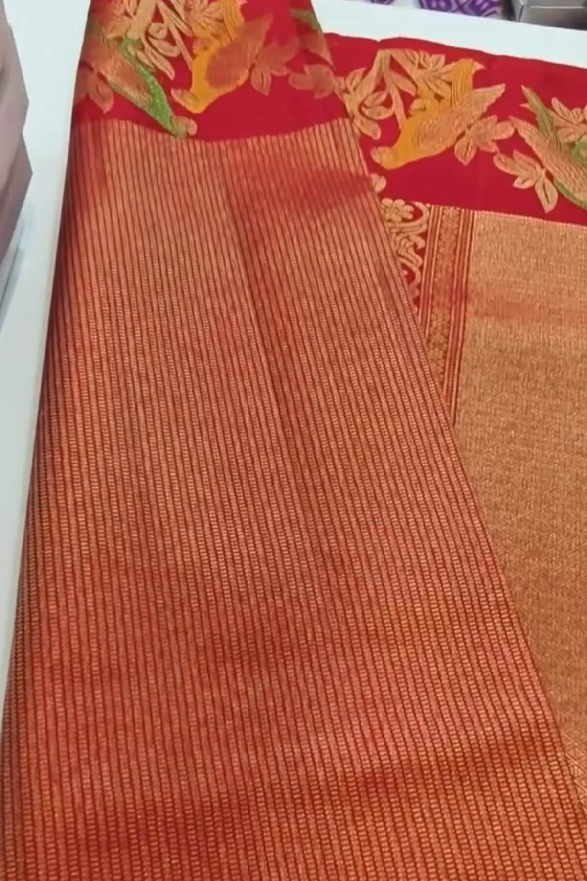 Surpassing Red Pure Zari Weaving Banarasi Silk Saree With Efflorescence Blouse Piece