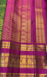Charming Dark Green Pure Zari Weaving Banarasi Silk Saree With Opulent Blouse Piece