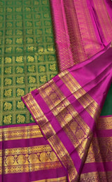 Charming Dark Green Pure Zari Weaving Banarasi Silk Saree With Opulent Blouse Piece