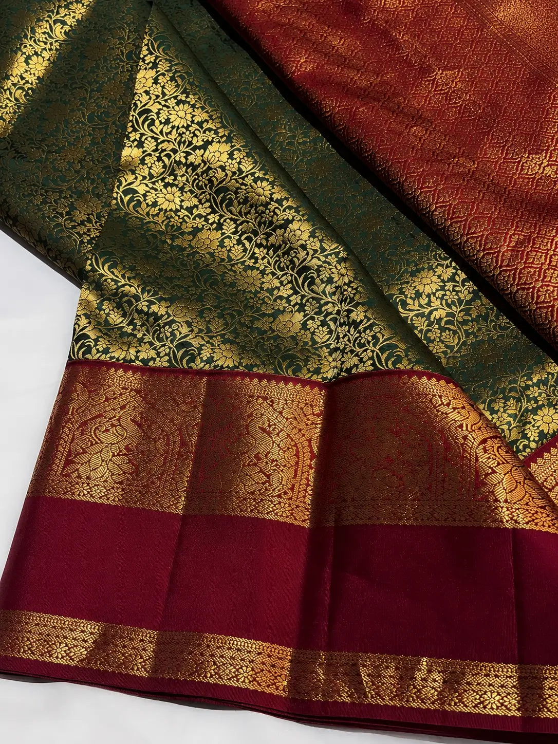 Artistic Dark Green Pure Zari Weaving Banarasi Silk Saree With Dazzling Blouse Piece