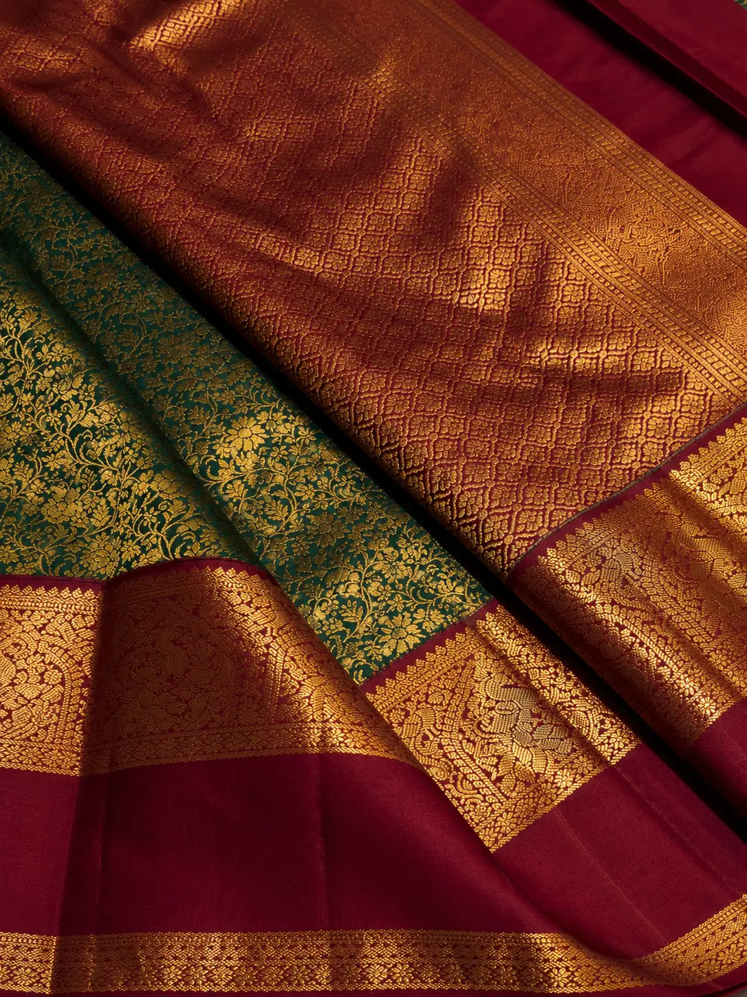 Artistic Dark Green Pure Zari Weaving Banarasi Silk Saree With Dazzling Blouse Piece