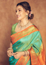 Exuberant Firozi Soft Silk Saree With Surreptitious Blouse Piece