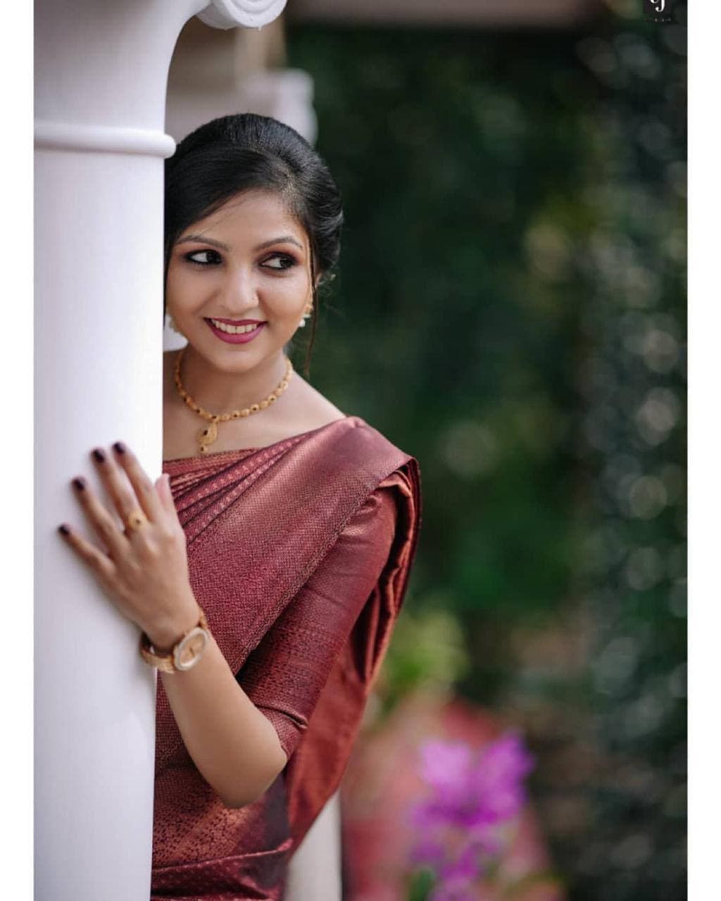Scintilla Wine Soft Banarasi Silk Saree With Intricate Blouse Piece