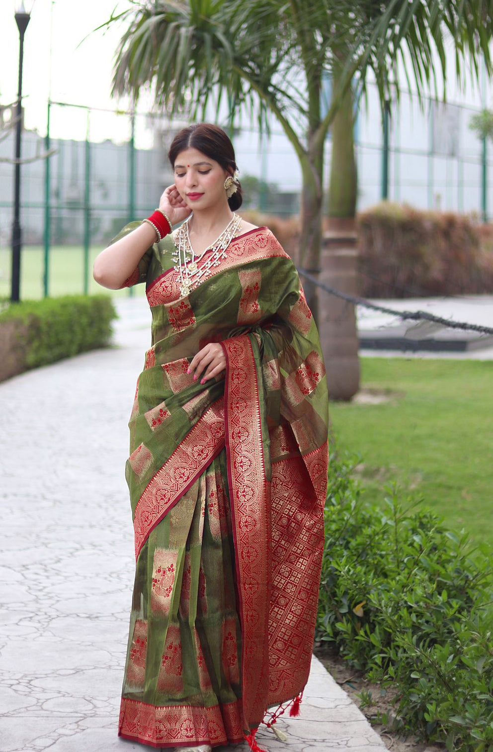 Trendy Green Organza Silk Saree With Dazzling Blouse Piece