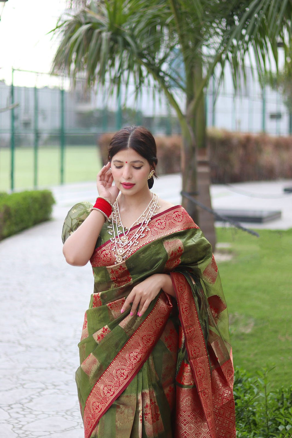 Trendy Green Organza Silk Saree With Dazzling Blouse Piece