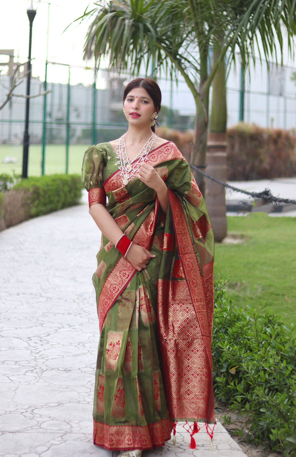 Trendy Green Organza Silk Saree With Dazzling Blouse Piece
