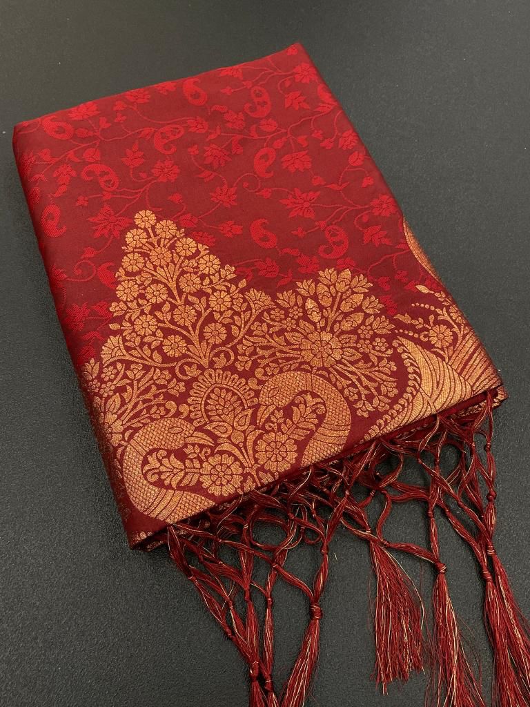 Flattering Maroon Soft Banarasi Silk Saree With Snazzy Blouse Piece