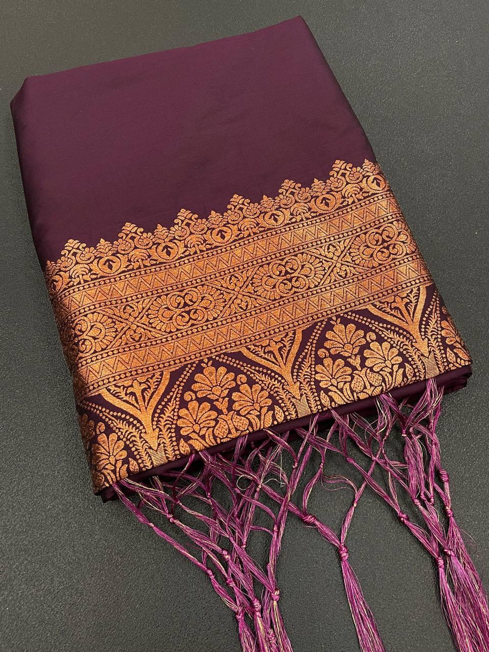 Pretty Wine Soft Banarasi Silk Saree With Snazzy Blouse Piece