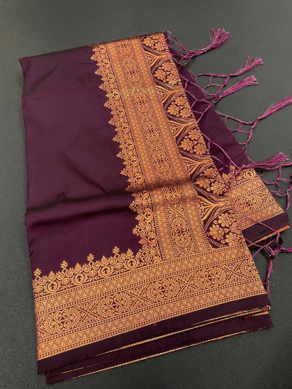 Pretty Wine Soft Banarasi Silk Saree With Snazzy Blouse Piece
