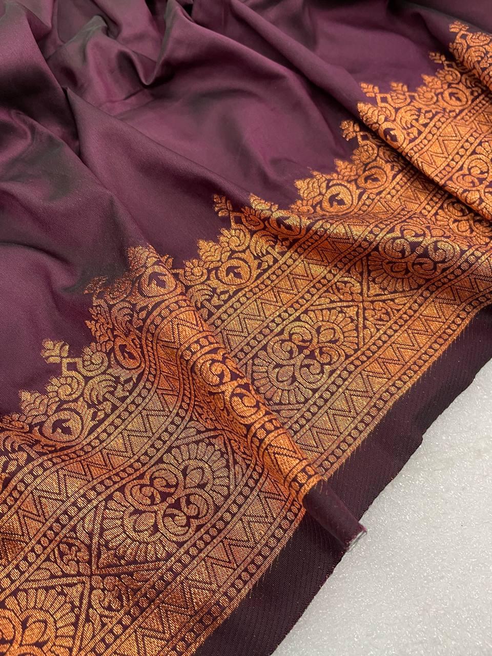 Pretty Wine Soft Banarasi Silk Saree With Snazzy Blouse Piece