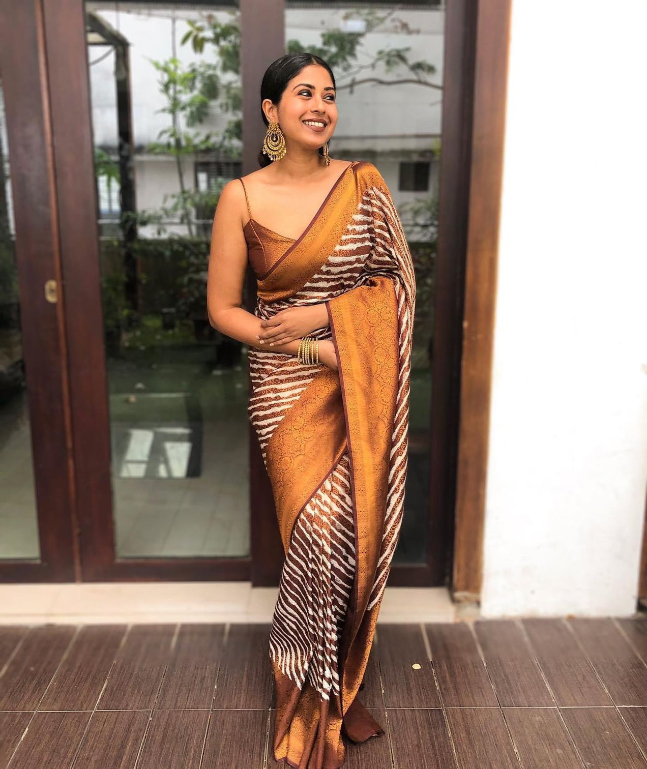 Pleasurable Brown Soft Banarasi Silk Saree With Magnetic Blouse Piece